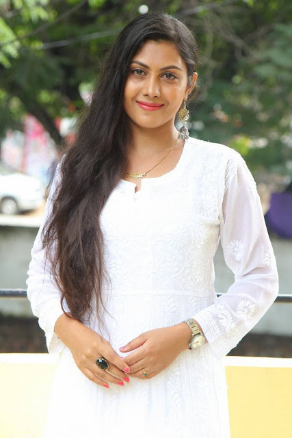 Television Actress Priyanka Naidu Long hair Stills In White Dress 5